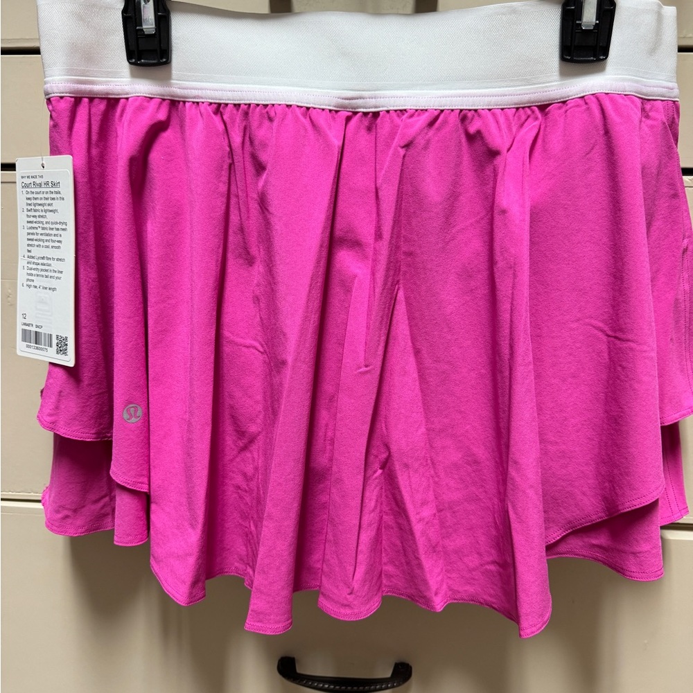 Brand new with tags - Lululemon Court Rival skirt! Never worn. Size 12